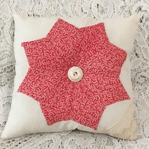 Small red white star pillow handmade from vintage star quilt top square with vintage button and lace