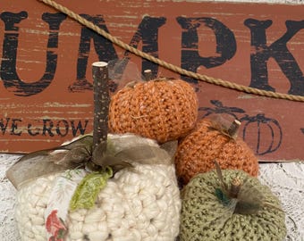 4 crocheted small pumpkins handmade embellished with stem ribbon white orange green
