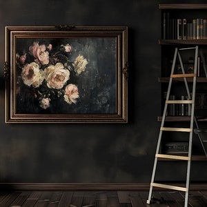 May include: An oil painting of white and pink roses in a dark, ornate gold frame hangs on a dark wall. A black lamp and a library ladder are also visible. The room has a classic, vintage aesthetic.