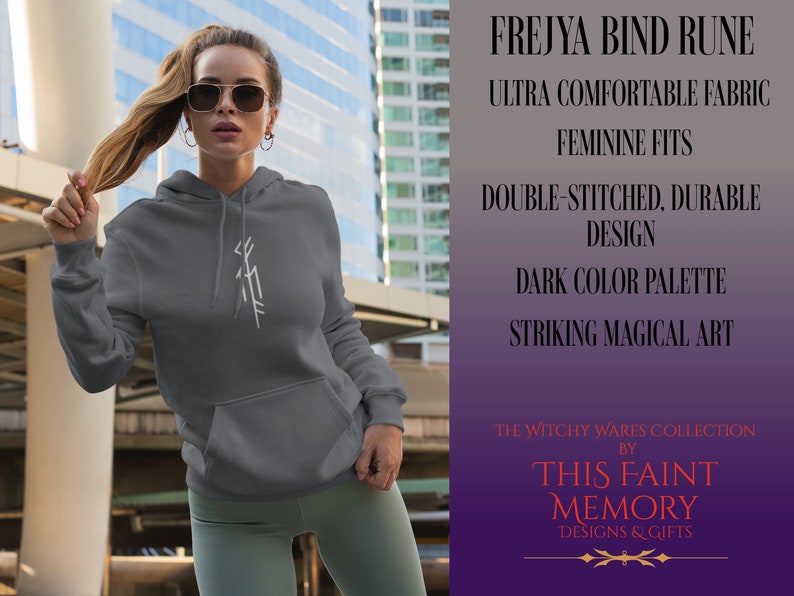 May include: A gray hooded sweatshirt with a white embroidered Frejya bind rune. The text "The Witchy Wares Collection by This Faint Memory Designs & Gifts" is printed on the bottom of the image.