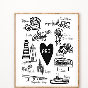 May include: A framed black and white illustration featuring various icons and text related to Prince Edward Island, including potatoes, a lobster, lighthouses, and the word "PEI" inside a heart. The artwork is displayed above a gray armchair.