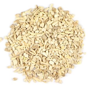 May include: A close-up of a pile of dried, light brown, and beige root pieces. The root pieces are irregularly shaped and have a rough texture.