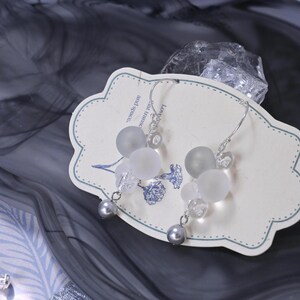 Bubble Earrings, Glass Bead Earrings, Silver Jewelry, Cloud-Inspired Earrings, Frosted Bead Earrings, Transparent Dewdrop Earrings, Celestial Accessories, Ethereal Fashion, Pearl Beaded Earrings, Handmade Statement Jewelry, Unique Aesthetic Earrings, Floating Bubble Design, Modern Minimalist Earrings, Lightweight Dangle Earrings, Dreamy Fashion Accessories, Silver-Toned Jewelry, Elegant Glass Earrings, Cloud-Like Floating Earrings, Artistic Handmade Jewelry