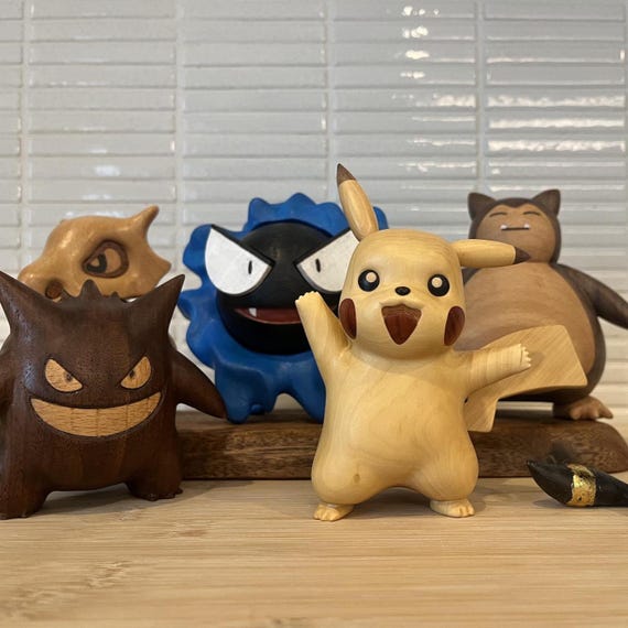 Handcrafted Wooden Cubone Figurine – Minimalist Pocket