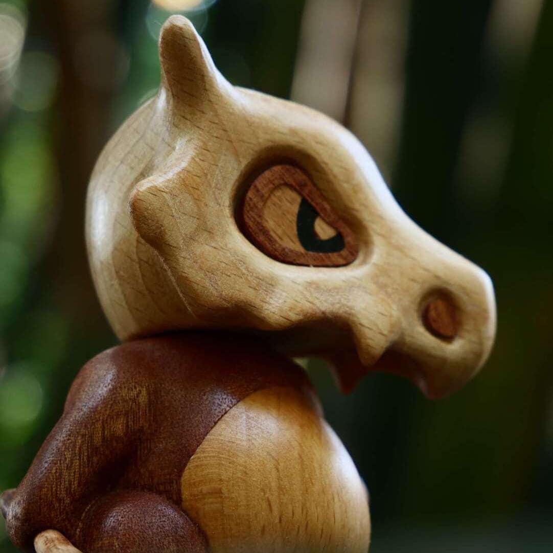 Handcrafted Wooden Cubone Figurine – Minimalist Pocket
