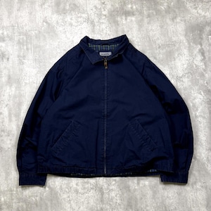 May include: A navy blue zip-up jacket featuring a pointed collar, long sleeves, and two front pockets. The interior lining displays a green and blue plaid pattern. A Lands' End brand label is visible on the inner collar area.