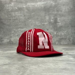 Vintage 80s Nebraska Cornhuskers NCAA Graphic Logo Trucker Snapback Hat OSFA