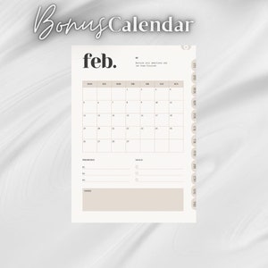 May include: A printable February calendar page with a simple design. The calendar has a section for priorities, goals, and notes. The text "Nurture your ambitions and let them flourish" is at the top of the page.