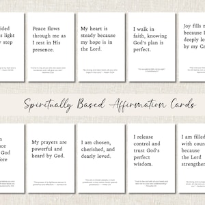 May include: A collection of white affirmation cards with black text. Each card features a different inspirational quote. The cards are labeled "Spiritually Based Affirmation Cards". The quotes include phrases about faith, hope, and strength.