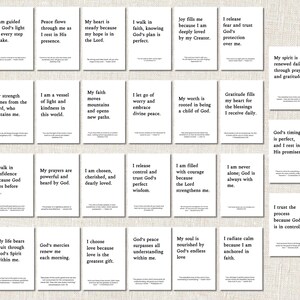 May include: A collection of white cards with black text featuring inspirational quotes and affirmations. The cards are arranged in rows and columns, with each card displaying a different message about faith, hope, and love.