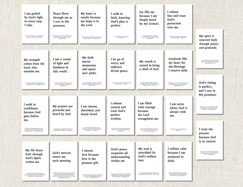 May include: A collection of white cards with black text featuring inspirational quotes and affirmations. The cards are arranged in rows and columns, with each card displaying a different message about faith, hope, and love.