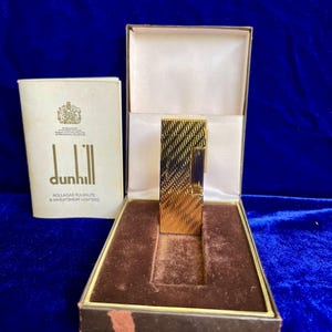 Encendedor vintage Rollagas Gold Dunhill, en perfecto estado, funciona con 1 año de garantía.