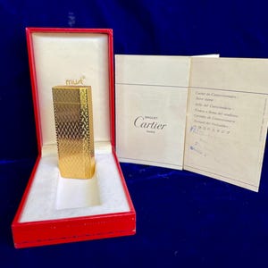 Zabytkowa zapalniczka Cartier Gold Pentagon w stanie Super Mint, działa, 1 rok gwarancji