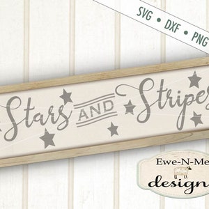 May include: A wooden sign with the text "Stars and Stripes" in a cursive font. The sign is decorated with stars and stripes. The sign is made by Ewe-N-Me Designs.