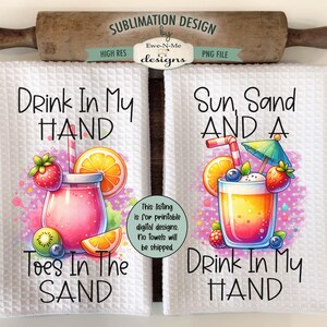 May include: Two sublimation designs for kitchen towels. The first towel features a pink drink with fruit and the text "Drink In My Hand Toes In The Sand". The second towel features a yellow drink with fruit and the text "Sun, Sand And A Drink In My Hand".