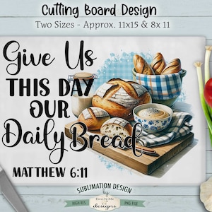 May include: White cutting board with a watercolor design of bread, a bowl of soup, and a jar of milk. The text "Give Us This Day Our Daily Bread Matthew 6:11" is printed in black.