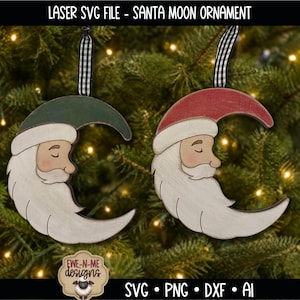 May include: Two crescent moon-shaped Santa Claus ornaments with black and white gingham ribbon hangers. One ornament features a dark green hat, the other a red hat. Both have white beards, white hat brims, and closed eyes. Text reads: LASER SVG FILE - SANTA MOON ORNAMENT.