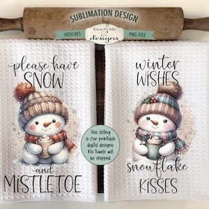 May include: Two white kitchen towels with a sublimation design featuring a snowman holding a cup of hot chocolate. The text on the towels reads "please have snow and mistletoe" and "winter wishes snowflake kisses".