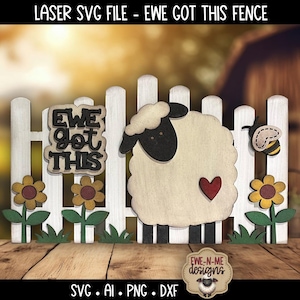 May include: Wooden fence decoration featuring a sheep, bee, and sunflowers. The fence has the text "EWE GOT THIS". The sheep has a red heart. The design is a laser SVG file.