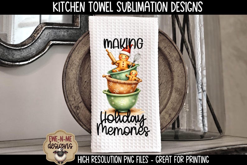 May include: White kitchen towel with a waffle weave texture. The towel features a design of gingerbread people in bowls with the words "MAKING Holiday Memories". The towel is displayed on a wooden plate.