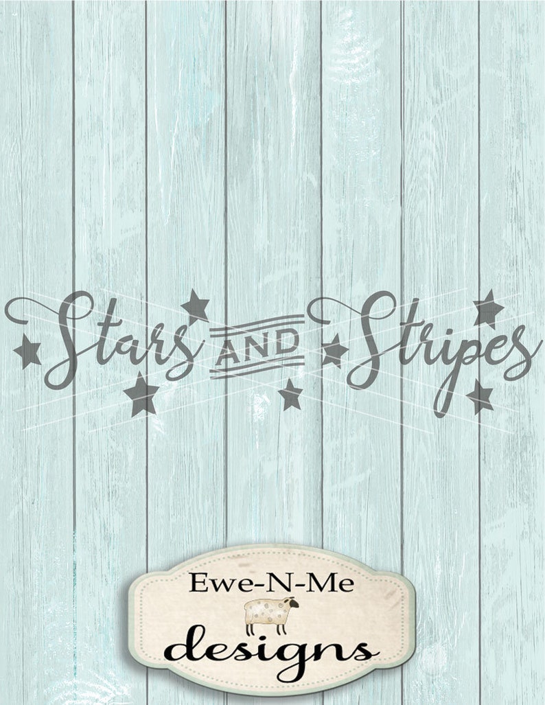 May include: A light blue wood background with the text "Stars and Stripes" in gray cursive lettering with stars around the text. Below the text is a white oval with a brown border and the text "Ewe-N-Me designs" in brown lettering.