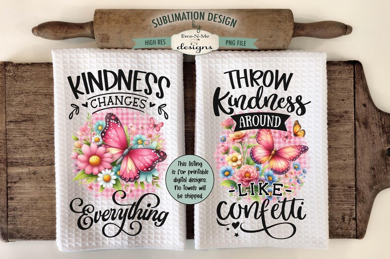 May include: Two white kitchen towels with a floral design and inspirational text. The first towel says "Kindness Changes Everything" and the second towel says "Throw Kindness Around Like Confetti".