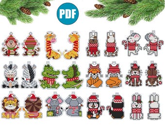 Peut inclure: Une collection d'ornements de Noël en point de croix représentant divers animaux, dont des singes, des girafes, des zèbres, des alligators, des renards, des chats, des lions, des éléphants, des pingouins et des lapins. Chaque ornement est orné de tenues festives et de détails de vacances.