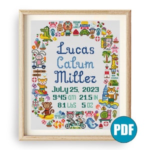 May include: Cross-stitch pattern featuring a colorful border of animals and objects, including a giraffe, a turtle, a monkey, a snail, a crab, and a sailboat. The center of the pattern includes the name "Lucas Calum Millez", the date "July 25, 2023", and the time "9:45 am". The pattern also includes the baby's measurements: "21.5 in", "8.1 lbs", and "5.0 oz".