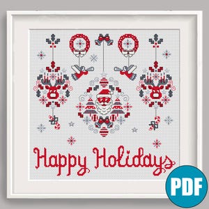 May include: A cross-stitch pattern featuring a festive winter scene with a Santa Claus, reindeer, and snowflakes. The pattern includes the text "Happy Holidays".