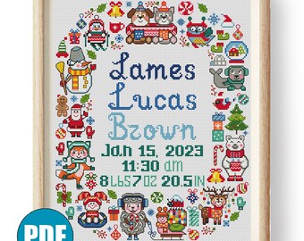 Peut inclure: Broderie au point de croix encadrée dans un cadre en bois, sur le thème de l'hiver. Le motif comprend une bordure circulaire de personnages et d'éléments festifs. Le nom "James Lucas Brown" est affiché, ainsi que les détails de naissance: 15 janvier 2023, 11h30, 3,8 kg et 52 cm.