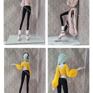May include: A doll in several crocheted outfits, including a pink cropped sweater, black leggings, and white and pink boots. The doll has long, light blue hair and wears headphones in some images. The outfits are handmade.