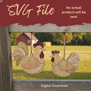 May include: Two wooden rooster ornaments hanging from twine. The roosters are light brown with darker brown accents and red combs. The image includes the text "SVG File" and "Digital Download". The background is a blurred outdoor scene.