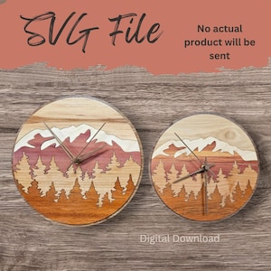 May include: Two wooden clocks with a mountain and forest design. The clocks have a light wood grain background, with a layered design of mountains, trees, and a sunset color scheme. The text "SVG File" and "Digital Download" are visible.