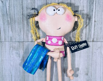 BuTT UgLee Surfer Kid named Tabitha, Pink Bikini, Beach Blanket, Whimsical Wall Art, Beach Art, Beach Lover, Summer, Ocean, OOAK art doll