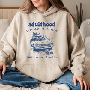 Adulthood Is Straight Up The Worst Hood I&#39;ve Lived In Hoodie,  Sarcastic Snarky, Funny Raccoon Hoodie, Adult Humor, Funny Sarcastic Quote
