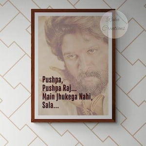 May include: A framed poster with a photo of a man with a beard and the text "Pushpa, Pushpa Raj... Main Jhukkega Nahi, Sala..."