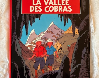 Les Aventures de Jo, Zette et Jocko: La Vallee des Cobras von Hergé, Erstausgabe Hardcover-Comic auf Französisch, veröffentlicht 1957 von Casterman