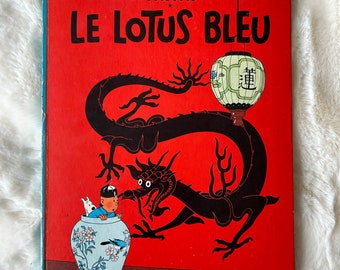 Les Aventures de Tintin: Le Lotus Bleu von Hergé, Erstausgabe eines Hardcover-Comics auf Französisch, veröffentlicht 1946 von Casterman