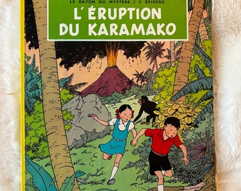 Les Aventures de Jo, Zette et Jocko : L'eruption du Karamako d'Hergé, première édition de la bande dessinée à couverture rigide, publiée en 1952 par Casterman