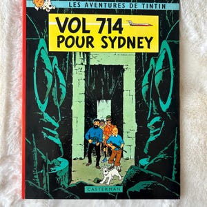 Les Aventures de Tintin: Vol 714 Pour Sydney by Hergé, First Edition Hardcover Comic Book in French, Published in 1968 by Casterman