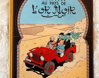 Les Aventures de Tintin: Tintin au Pays de L'or Noir de Hergé, primeira edição de quadrinhos de capa dura em francês, publicada em 1950 por Casterman
