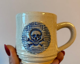 Small Handmade Ceramic Mug with Woven Skull