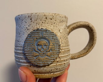 Small Handmade Ceramic Mug with Woven Skull