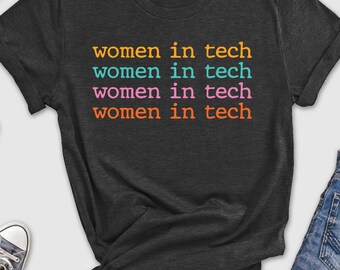 May include: A dark grey t-shirt with the text "women in tech" repeated four times in different colors: orange, teal, pink, and orange.