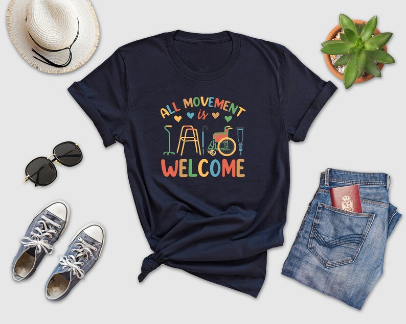 a t - shirt that says, all movement is welcome