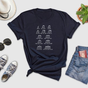 a t - shirt that has musical notes on it