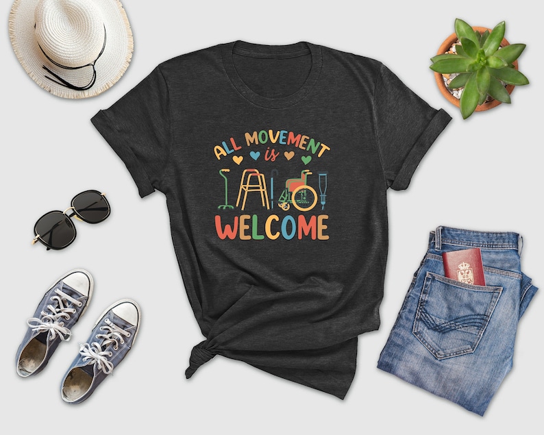 a t - shirt that says, all movement is welcome