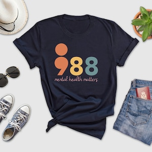 988 Shirt, Mental Health Matters Shirt, The World is a Better Place With You In It Shirt, Suicide Awareness Shirt, 988 Suicide Crisis Shirt