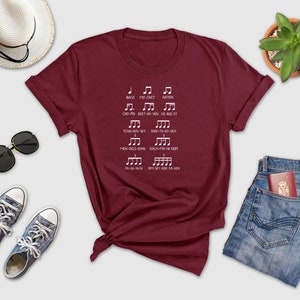 a t - shirt that has musical notes on it