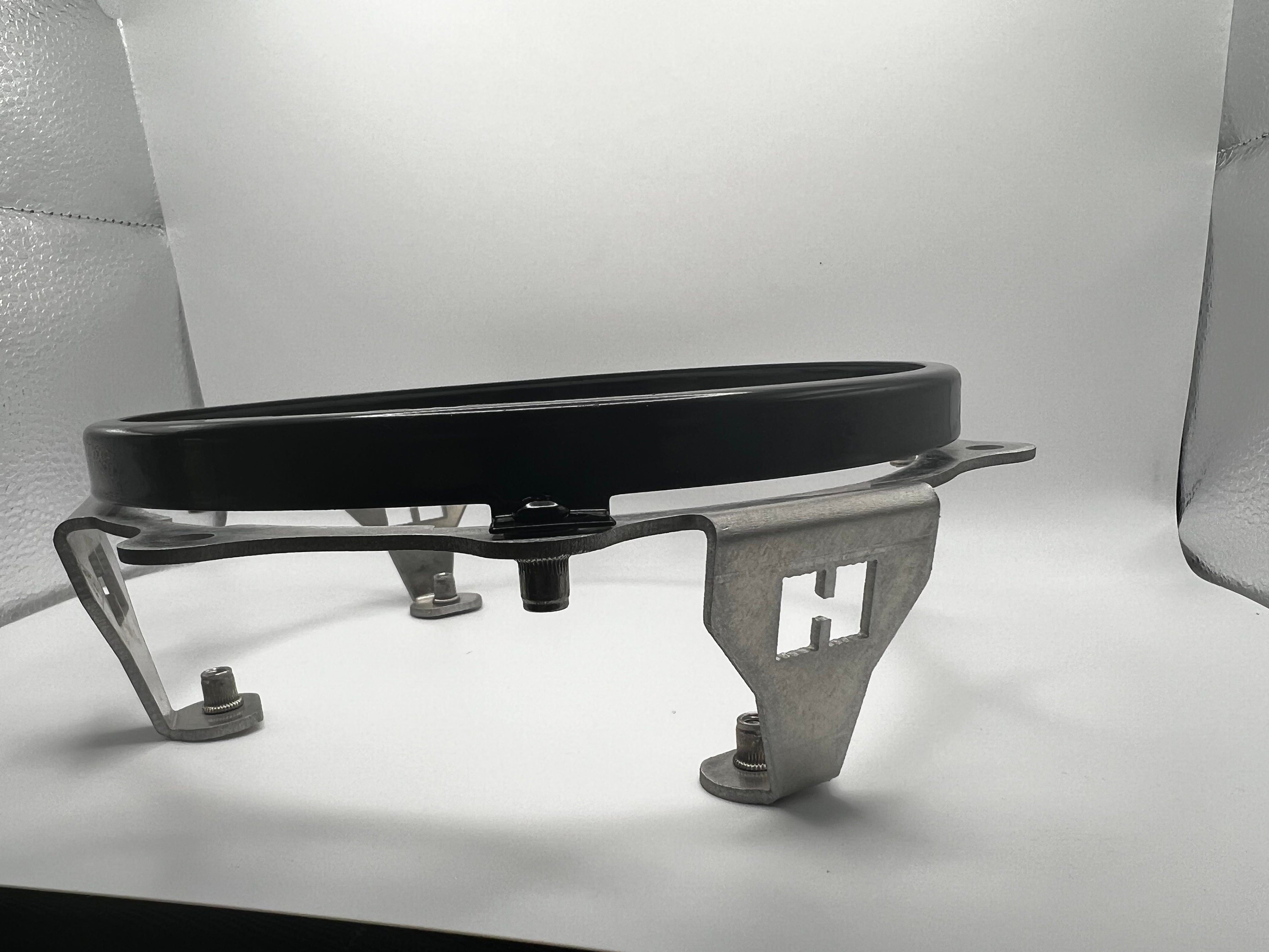 Hummer H3 Headlight Adapters for 7" round headlights.